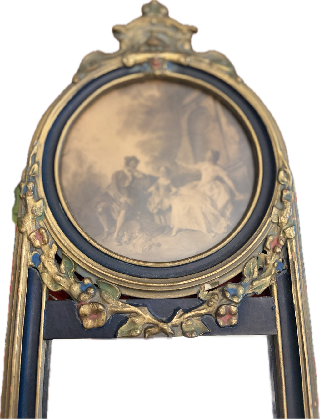 Antique oval-topped decorative mirror with an inset print and ornate frame.