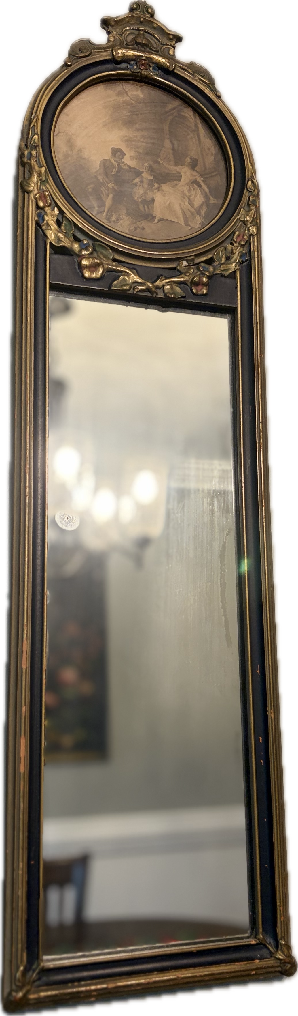 Antique oval-topped decorative mirror with an inset print and ornate frame.