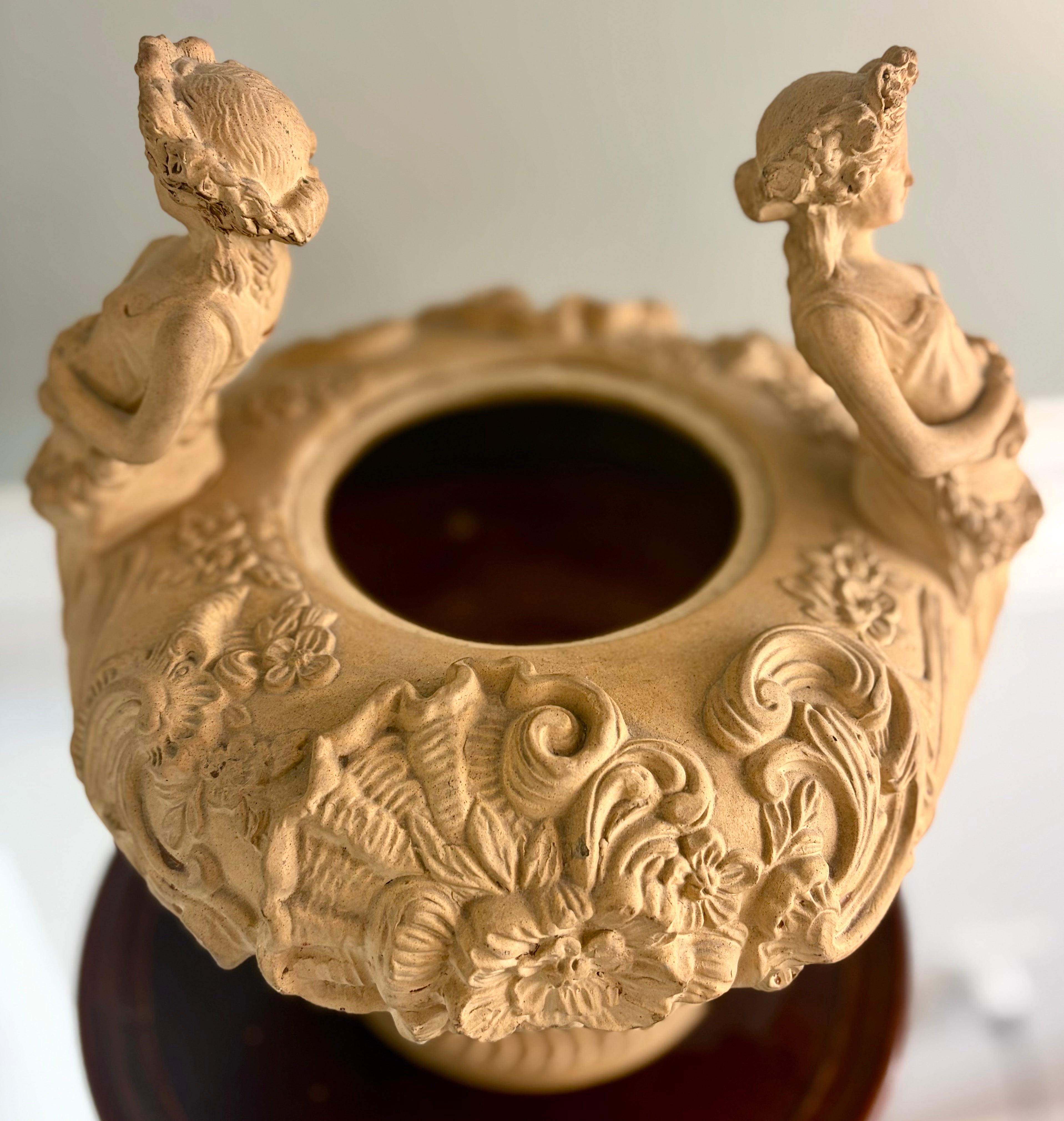 Late 19th–Early 20th Century French Clay Covered Urn with Figural Bust Handles