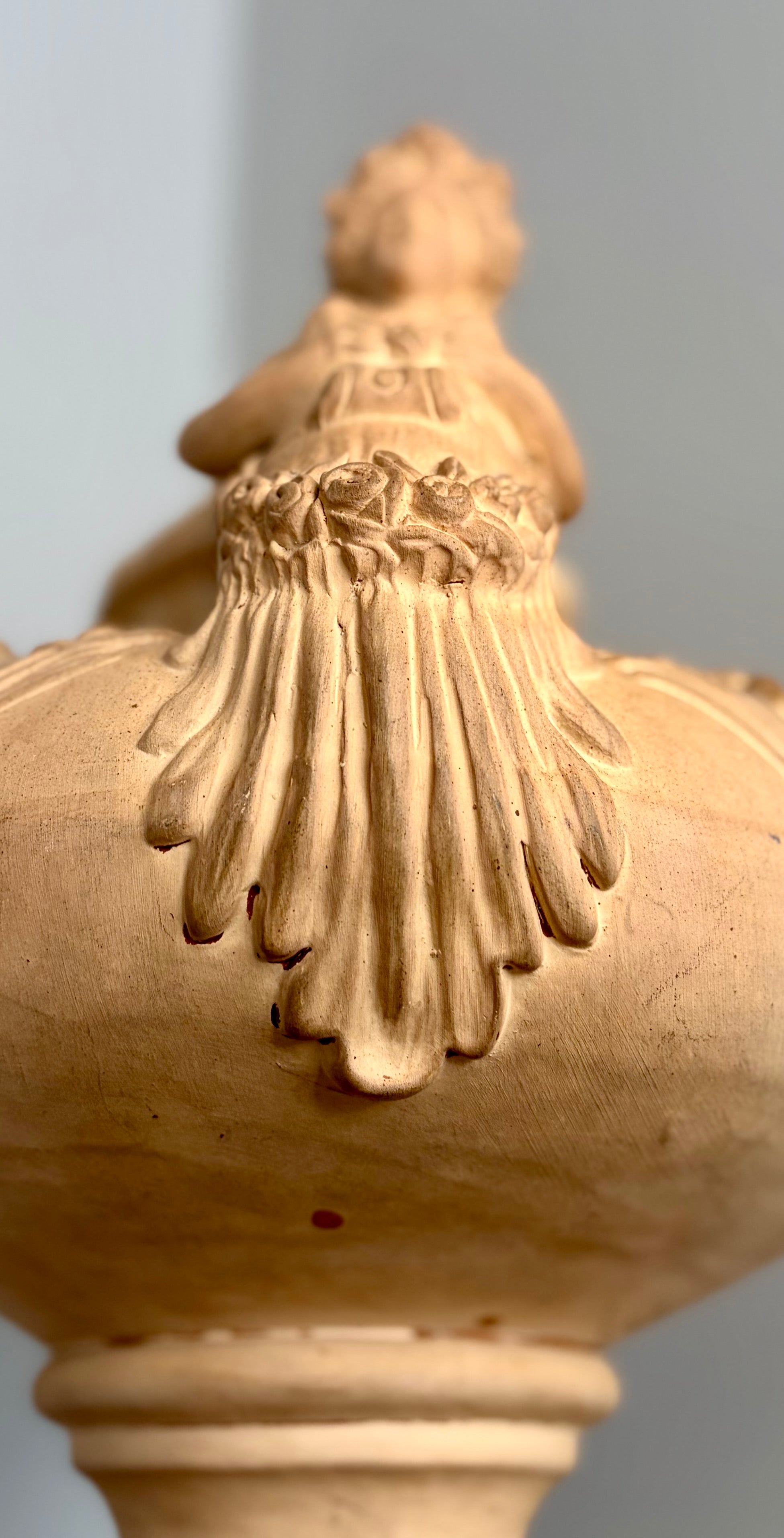 Late 19th–Early 20th Century French Clay Covered Urn with Figural Bust Handles