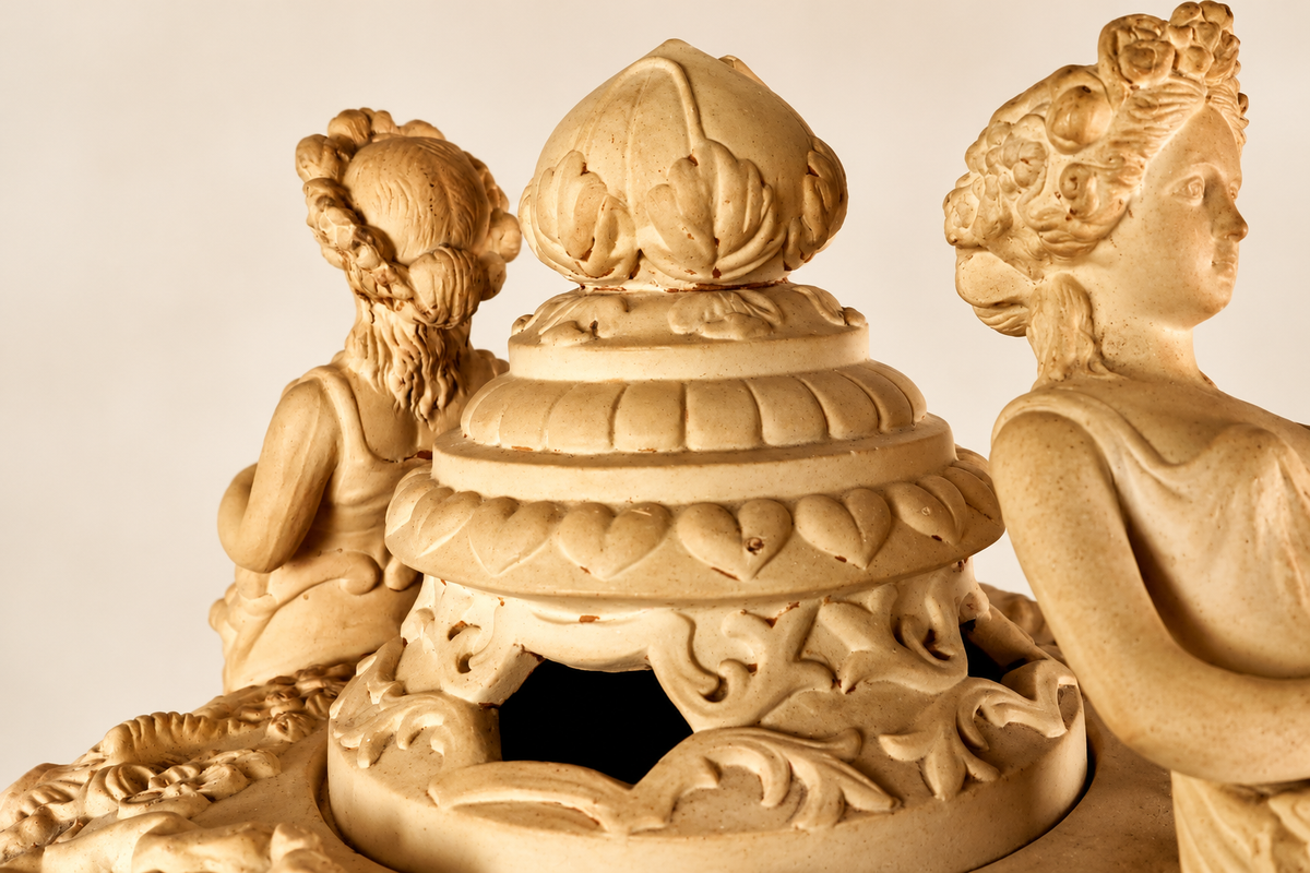 Late 19th–Early 20th Century French Clay Covered Urn with Figural Bust Handles