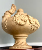 Late 19th–Early 20th Century French Clay Covered Urn with Figural Bust Handles