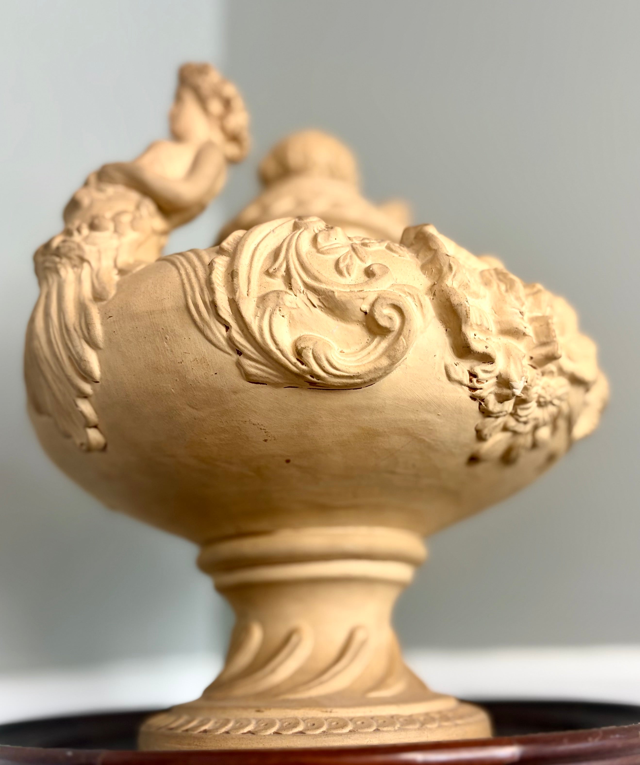 Late 19th–Early 20th Century French Clay Covered Urn with Figural Bust Handles