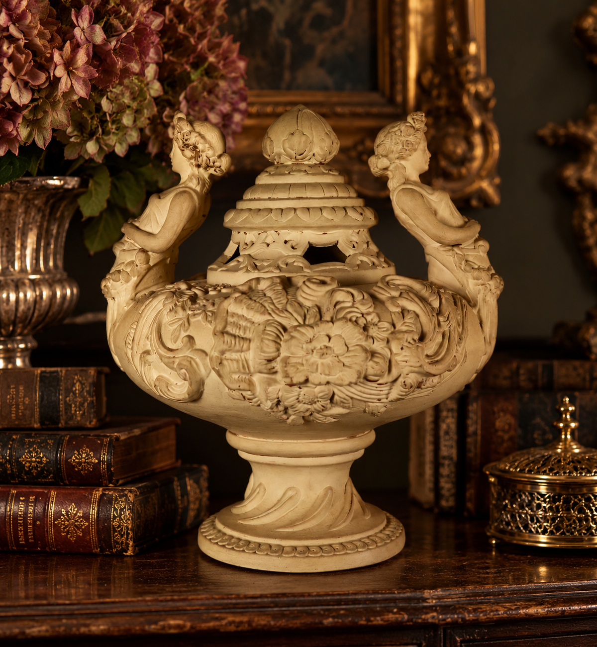 Late 19th–Early 20th Century French Clay Covered Urn with Figural Bust Handles
